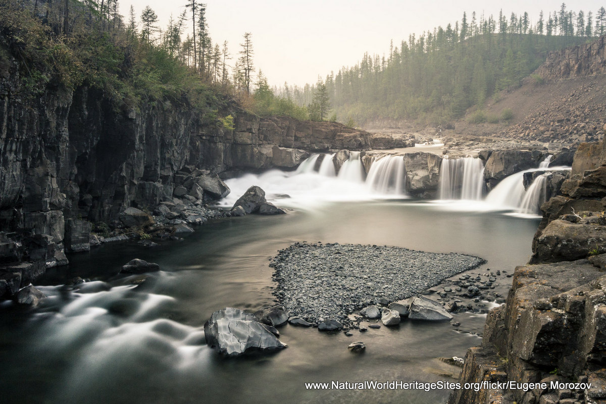 Putorana Plateau, a waterfall on the Grayling Stream. Mountain stream on a  cloudy day Stock Photo - Alamy