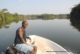 Crossing the Moa River to Tiwai Island in the Gola-Tiwai Complex UNESCO world heritage site in Sierra Leone, West Africa