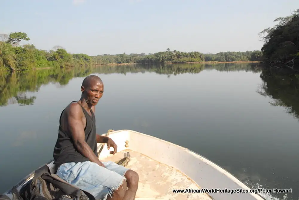 Crossing the Moa River to Tiwai Island in the Gola-Tiwai Complex UNESCO world heritage site in Sierra Leone, West Africa